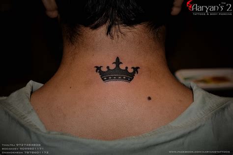 simple king crown tattoo.